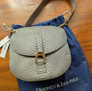 New With TagDooney & Bourke Texxtured Gray Crossbody Bag. Color Is called Stone.
